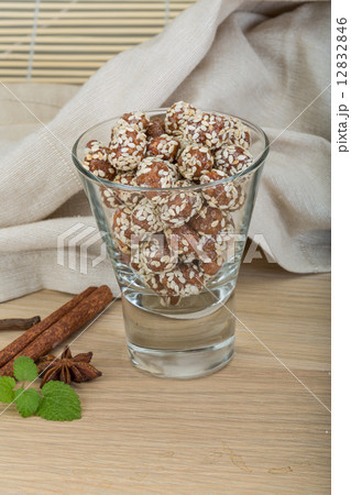 Peanut in honey with sesame seeds Peanut in honey with sesame seeds 12832846