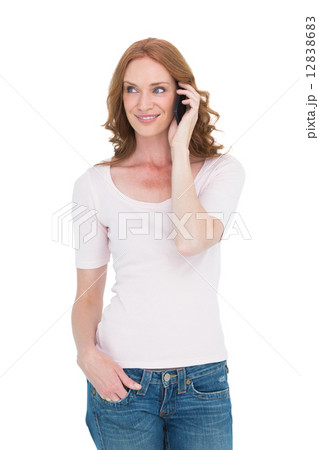 Pretty redhead on the phone 12838683