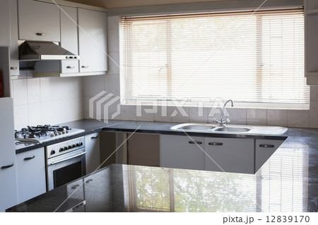 Empty kitchen with white cabinets Empty kitchen with white cabinets 12839170