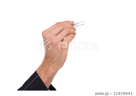 Hand of businessman holding tweezers 12839441