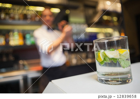 Close up of a mojito at bar counter Close up of a mojito at bar counter 12839658