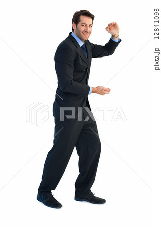 Businessman presenting with his hands 12841093