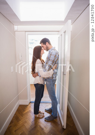 Cute couple standing in the hall Cute couple standing in the hall 12841700