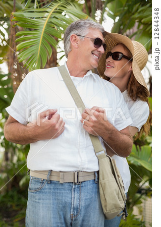Holidaying couple smiling at each other 12844348