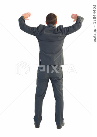 Businessman standing with hands up 12844403