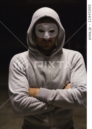 Criminal in mask looking at camera Criminal in mask looking at camera 12845000