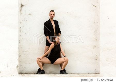 Beautiful couple of professional artists dancing 12847938