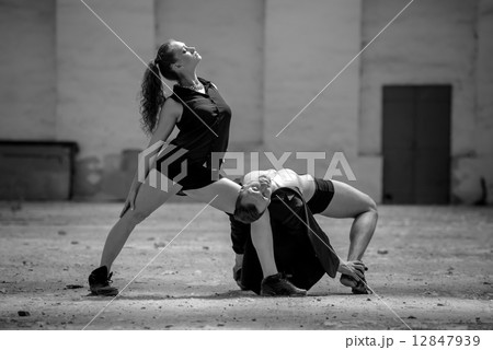 Beautiful couple of professional artists dancing 12847939