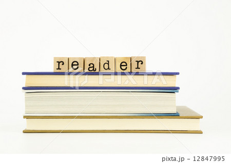 reader word on wood stamps and books 12847995