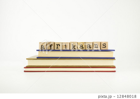 afrikaans language word on wood stamps and books 12848018