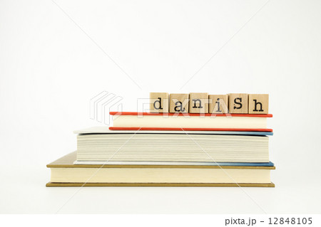 danish language word on wood stamps and books 12848105