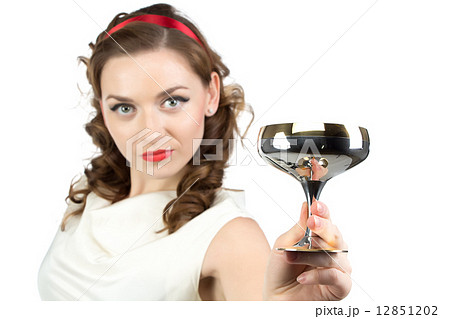 Image of woman with metal snifter 12851202