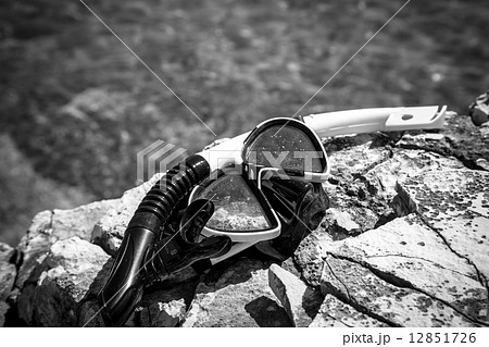 diving goggles on the beach 12851726