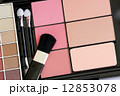 makeup brush and make-up eye shadows 12853078