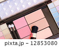makeup brush and make-up eye shadows 12853080