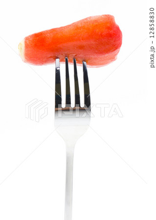 Rose apple piece with fork isolated on white. Rose apple piece with fork isolated on white. 12858830
