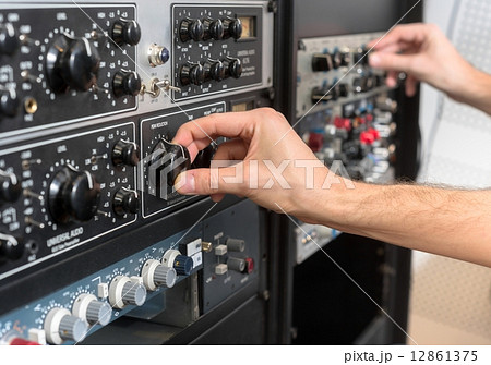 Closeup photo of an audio mixer Closeup photo of an audio mixer 12861375