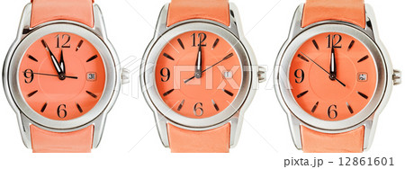 set of orange wristwatches with midnight time 12861601