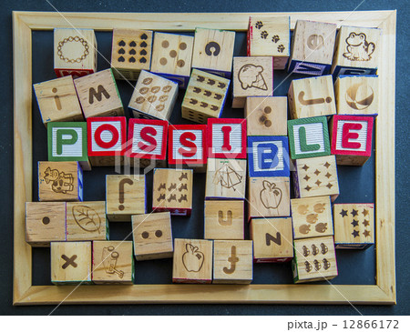 Colorful wooden word Impossible on blackboard Colorful wooden word Impossible on blackboard 12866172