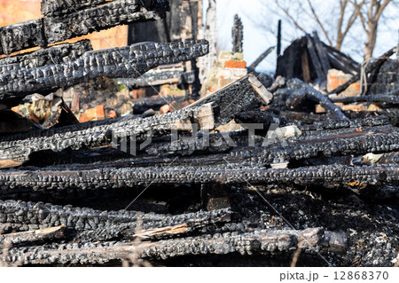 Ruins and remains of a burned down house Ruins and remains of a burned down house 12868370