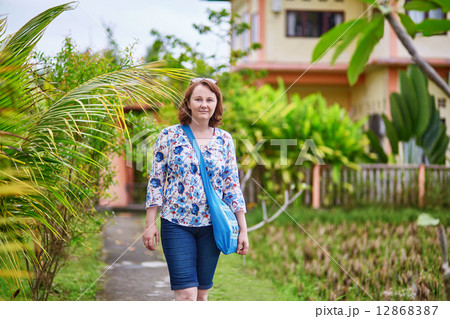 Tourist walking near the rice fields in Ubud, Bali 12868387
