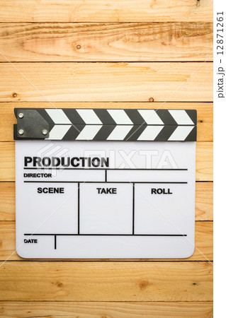 Movie slate film on wooden table 12871261