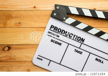 Movie slate film on wooden table 12871264