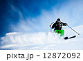 Man's skiing downhill in fresh snow. West Alps, Italy Man's skiing downhill in fresh snow. West Alps, Italy 12872092