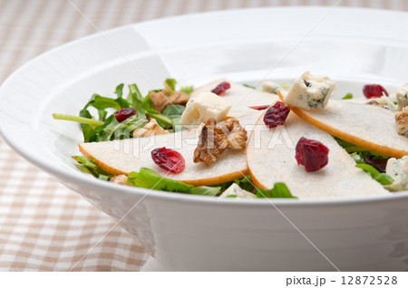 Fresh pears arugula gorgonzola cheese salad Fresh pears arugula gorgonzola cheese salad 12872528