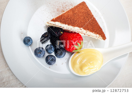 tiramisu dessert with berries and cream 12872753