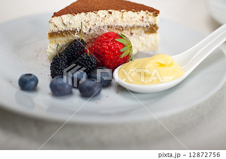 tiramisu dessert with berries and cream 12872756