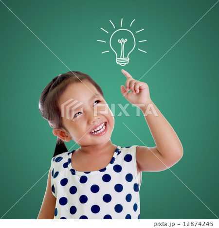 Portrait of cute girl point up 12874245