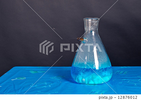 Blue bottle with dry ice. Blue bottle with dry ice. 12876012