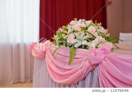 Flowers on a pink table Flowers on a pink table 12876046