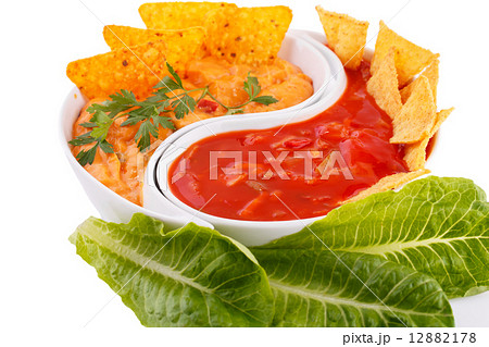 Nachos, cheese and red sauce,  vegetables 12882178