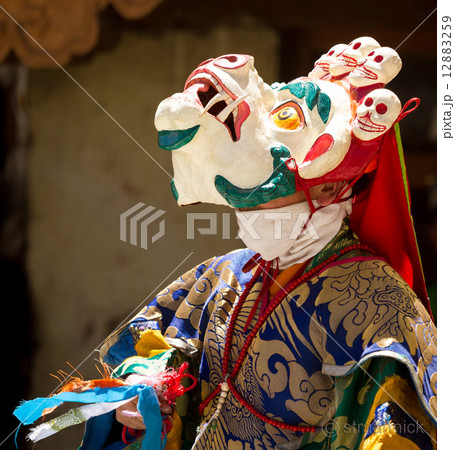 The unidentified monk performs a religious mask dance during the The unidentified monk performs a religious mask dance during the 12883259