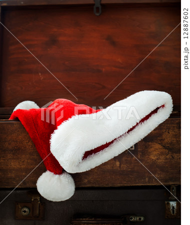 Two Christmas Santa Caps in Open Suitecase 12887602