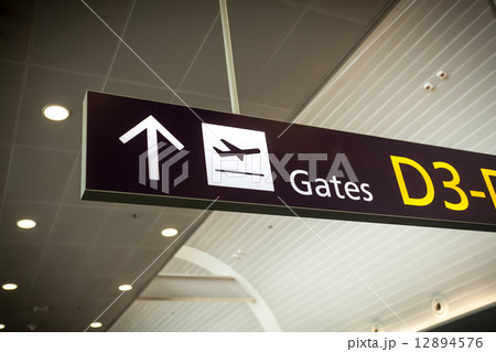 photo of direction sign in modern airport photo of direction sign in modern airport 12894576