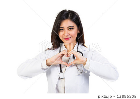 Asian female doctor making heart shape with fingers Asian female doctor making heart shape with fingers 12896508