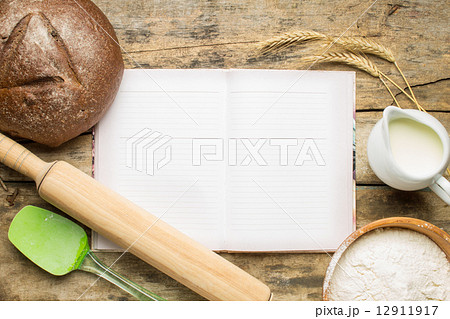 Cookbook with baking ingredients 12911917