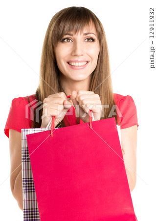 Dreaming happy young woman with shopping bag 12911932