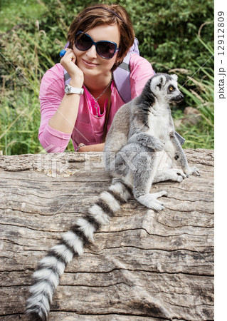Ring-tailed lemur and young caucasian woman 12912809