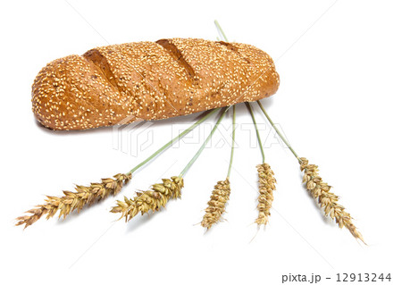 Wheat and bread on white background 12913244