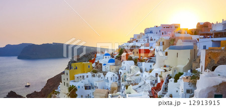Oia village on Santorini in sunset, Greece. 12913915