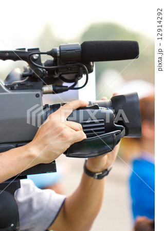 Close up of cameraman. Close up of cameraman. 12914292