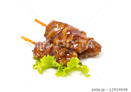 Chicken teriyaki with skewers isolated on white. 12914646