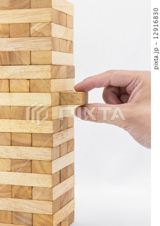 Blocks of wood and hand isolated on white background 12916830