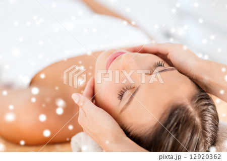 beautiful woman getting face or head massage beautiful woman getting face or head massage 12920362