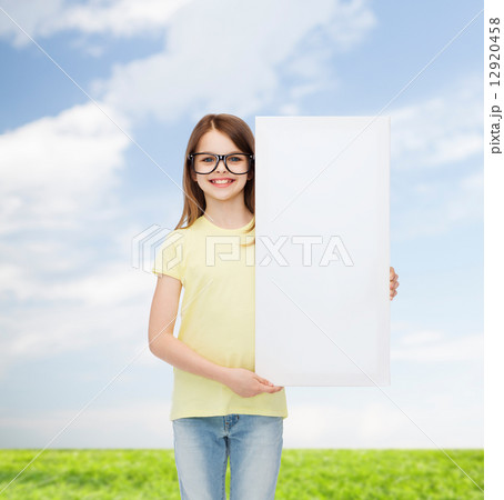 little girl wearing eyeglasses with blank board 12920458