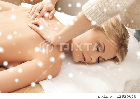 beautiful young woman in spa salon getting massage 12920659